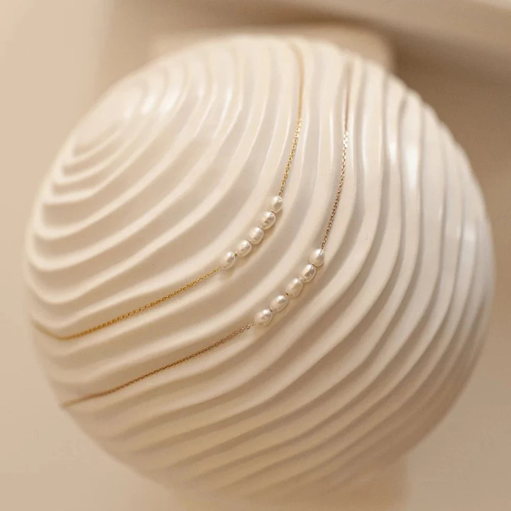 The Odette Pearl Arc Necklace