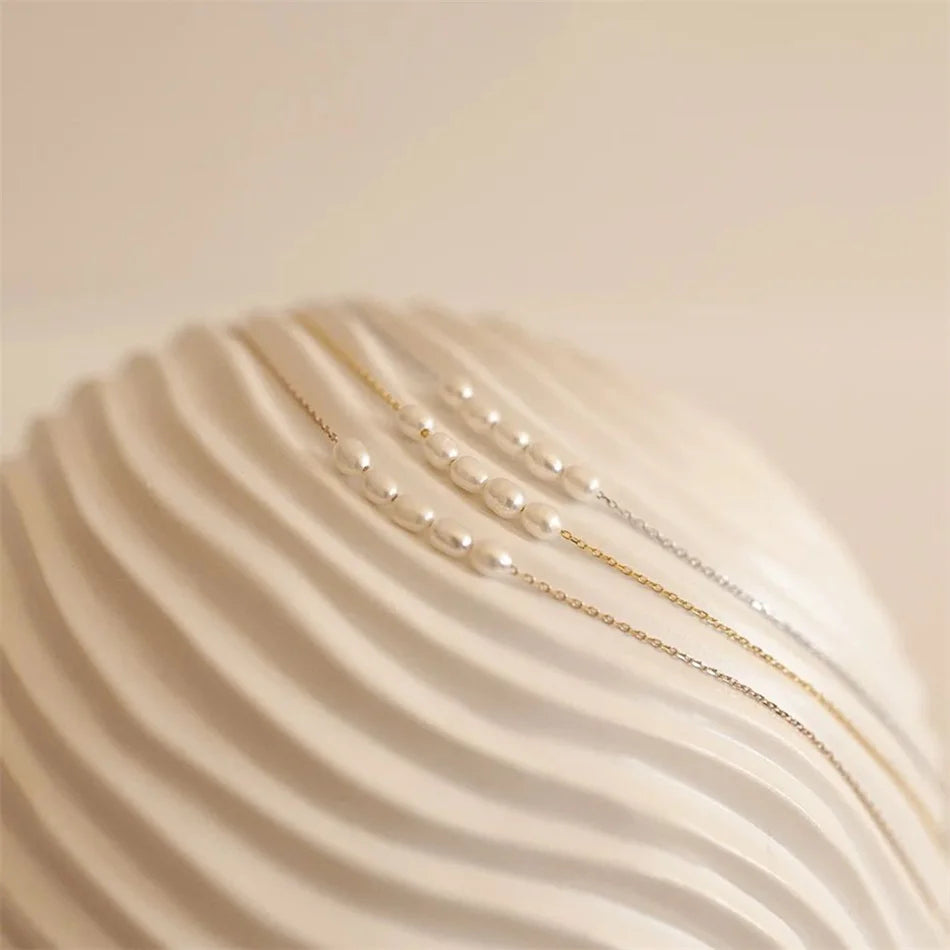 The Odette Pearl Arc Necklace