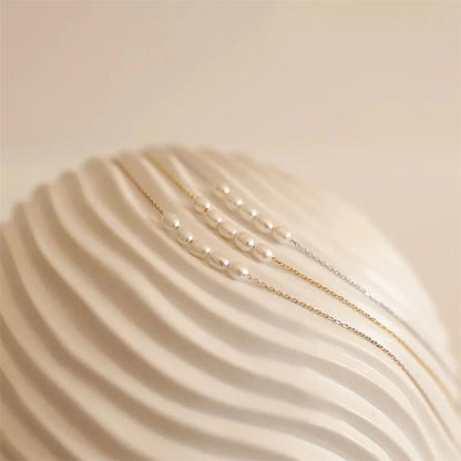 The Odette Pearl Arc Necklace